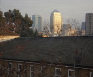 Canary_Wharf_over_rooftops_from_loft_suite