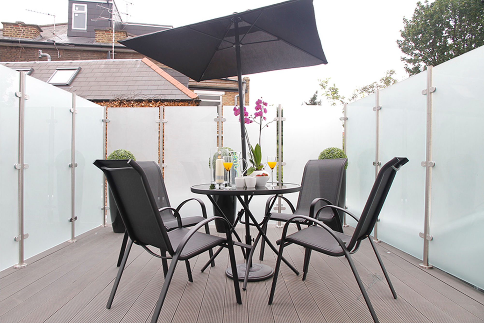 Private rooftop terrace with dining set